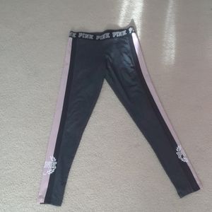 Victoria Secret PINK leggings with a pink stripe.